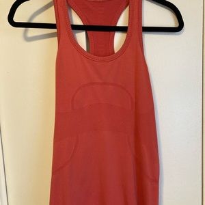 Women’s lululemon swiftlytech racer back tank top. Heathered grapefruit.